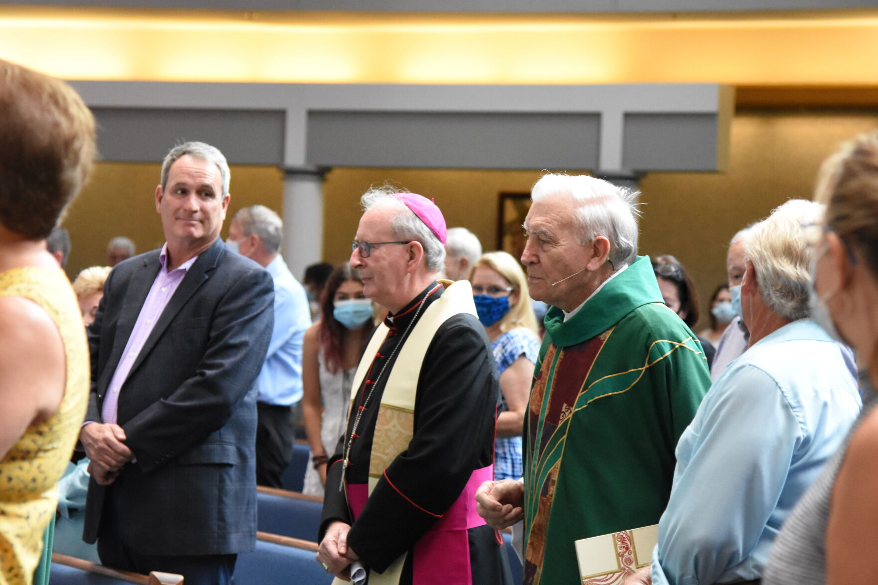 Bishop John Noonan (left) and Monsignor John Bluett at monsignor’s farewell Mass, June 13. Both priests are from Limerick, Ireland. (GLENDA MEEKINS)